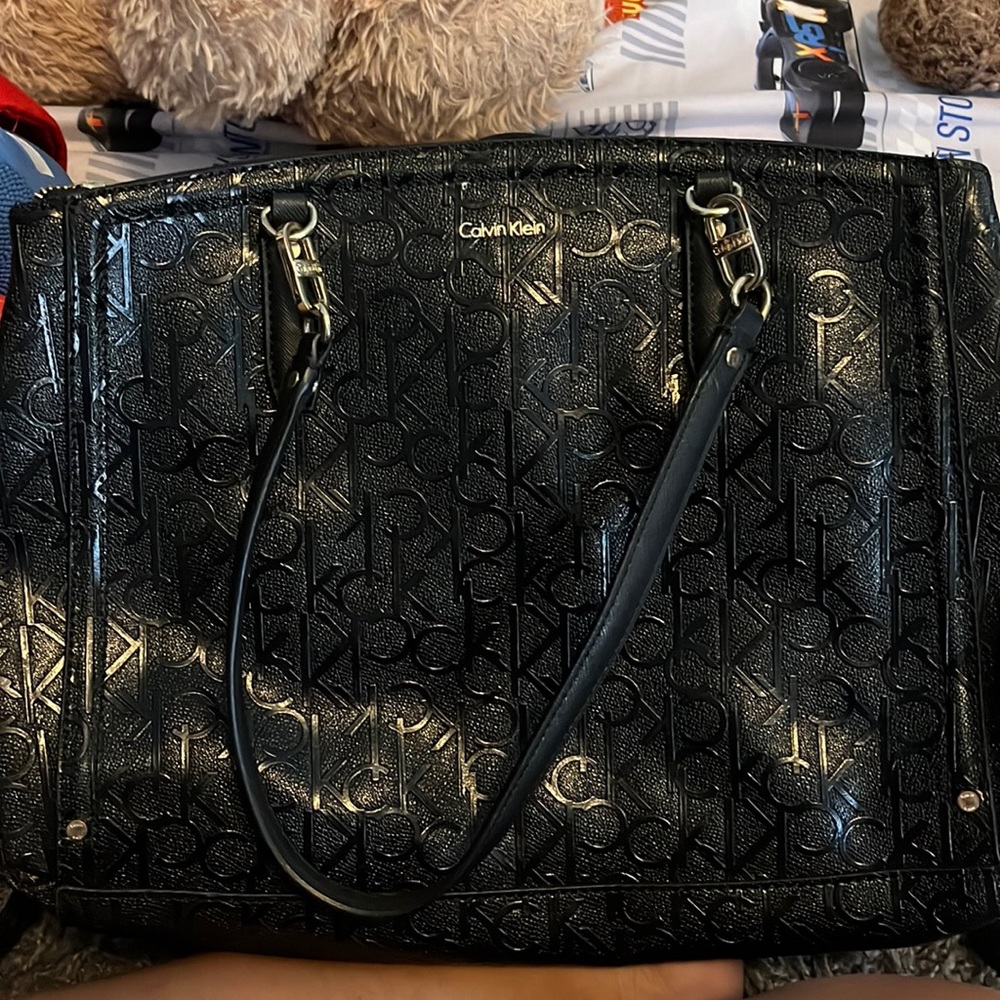 Selling a black Calvin Klein purse used around 6 months only. purchased on macys